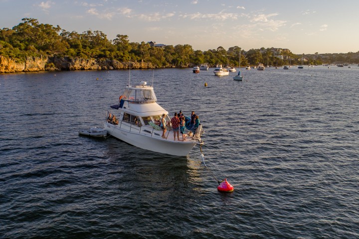 a small boat in a large body of water