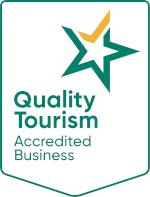 Quality Tourism Accredited Business badge with a star design.