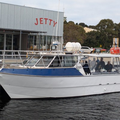 a boat is docked in the water